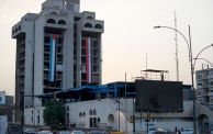 The Palestinian (L) and Iraqi flags are hung on the building of the Turkish Restaurant in Baghdad on October 12, 2023, to express support for the Palestinians as fighting rages between Israel and the Hamas movement for the sixth consecutive day. In towns across the Arab world, pro-Palestinian sentiment has surged after a shock Hamas attack on Israel, sparking a groundswell of solidarity for the Palestinians. (Photo by Ahmad AL-RUBAYE / AFP) (Photo by AHMAD AL-RUBAYE/AFP via Getty Images)