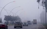 MOSUL, IRAQ - JANUARY 03: Vehicles are seen on their way during foggy weather in Mosul, Iraq on January 03, 2024. (Photo by Ismael Adnan Yaqoob/Anadolu via Getty Images)