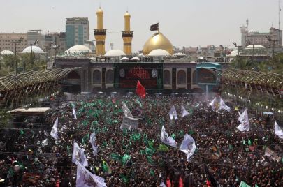 Shiite Muslim devotees attend a gathering to commemorate Ashura, a ten-day period during the Islamic month of Muharram to remember and mourn the seventh century killing of Prophet Mohammed's grandson Imam Hussein in Iraq's central holy city of Karbala on July 29, 2023. (Photo by Mohammed SAWAF / AFP) (Photo by MOHAMMED SAWAF/AFP via Getty Images)