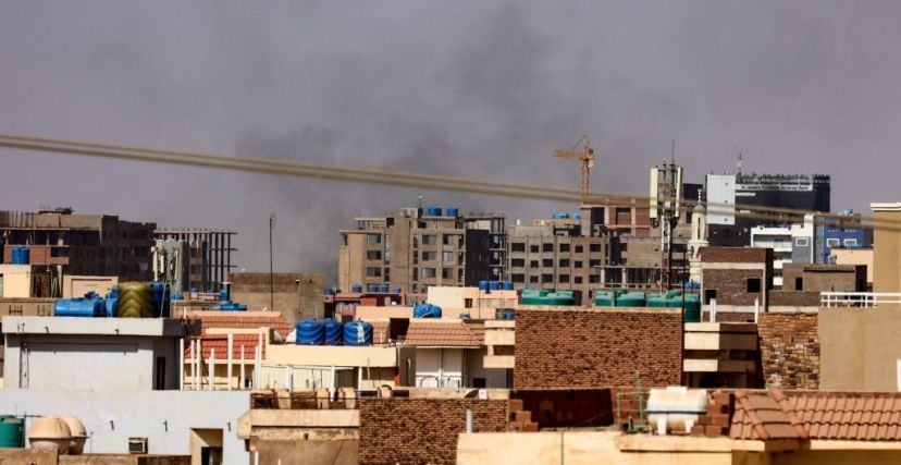 Smoke billows over residential buildings in eastern Khartoum on April 22, 2023, during ongoing battles between the forces of two rival generals. - Fighting in Sudan's capital entered a second week today as crackling gunfire shattered a temporary truce, the latest battles between forces of rival generals that have already left hundreds dead and thousands wounded. (Photo by AFP) (Photo by -/AFP via Getty Images)